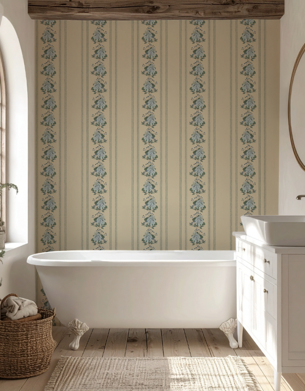 Bathroom with a freestanding bathtub, patterned wallpaper, and wooden floor.