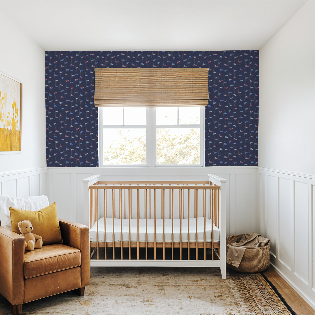 Nursery room with wooden crib, brown armchair, and patterned walls.