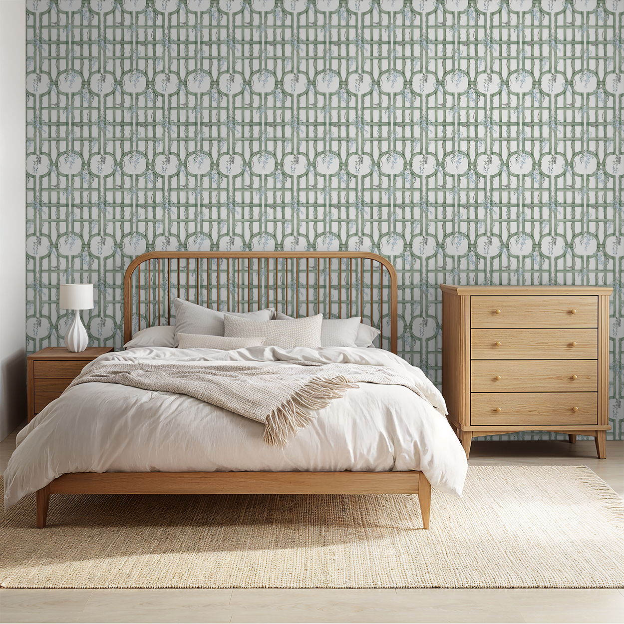 Bedroom with green trellis wallpaper, wooden furniture, and neutral bedding.