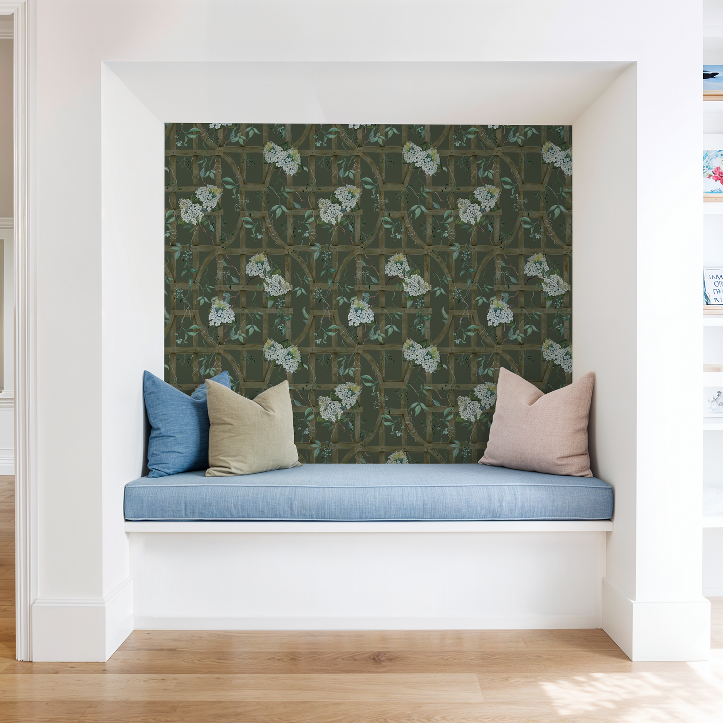 Hydrangea floral trellis wallpaper in cozy reading nook with cushions