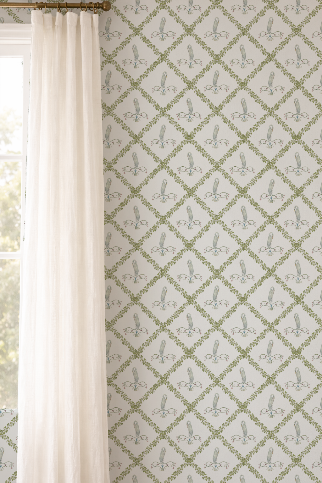 Wallpaper with a diamond pattern on a wall next to a window with white curtains.
