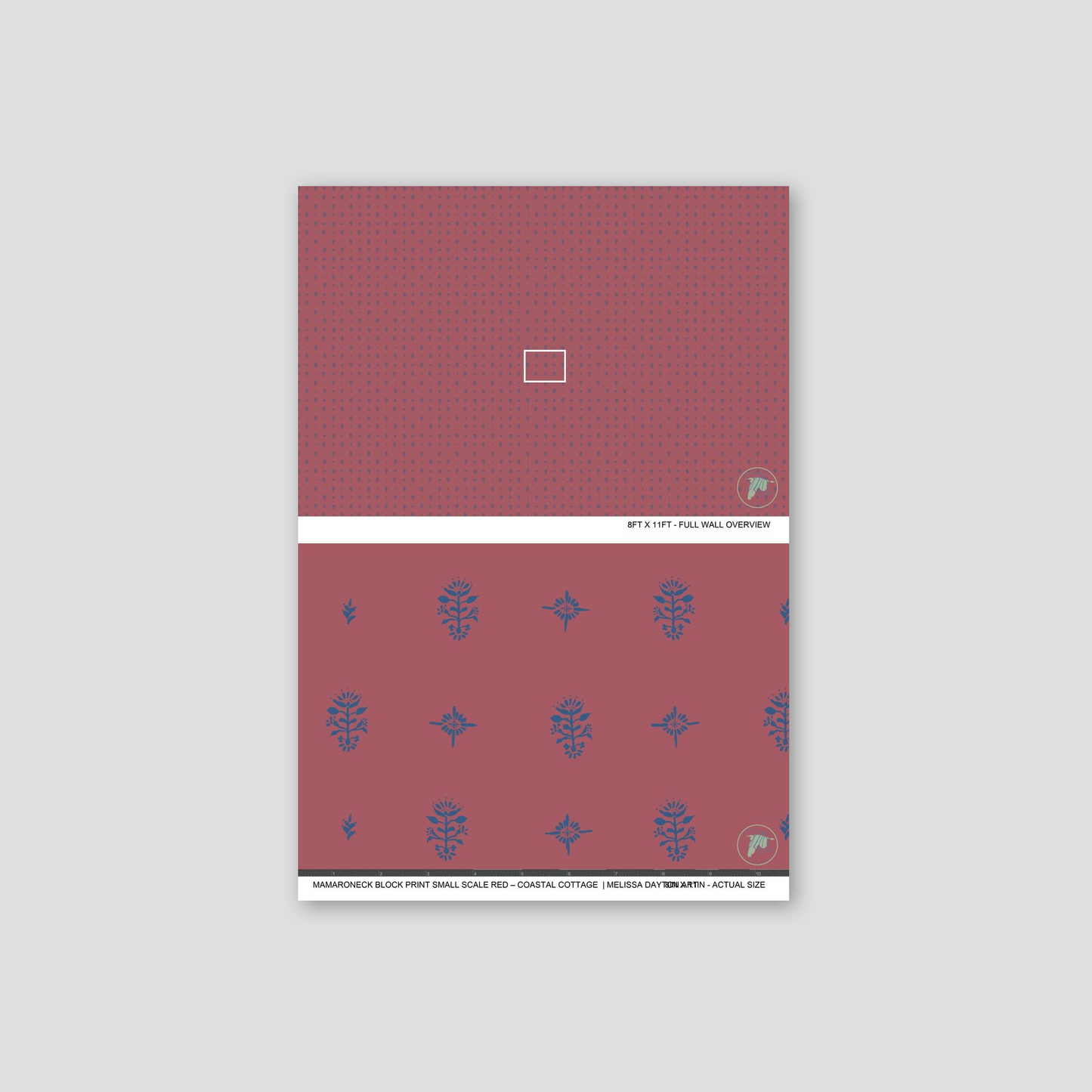 Red notebook with blue floral patterns on a light gray background