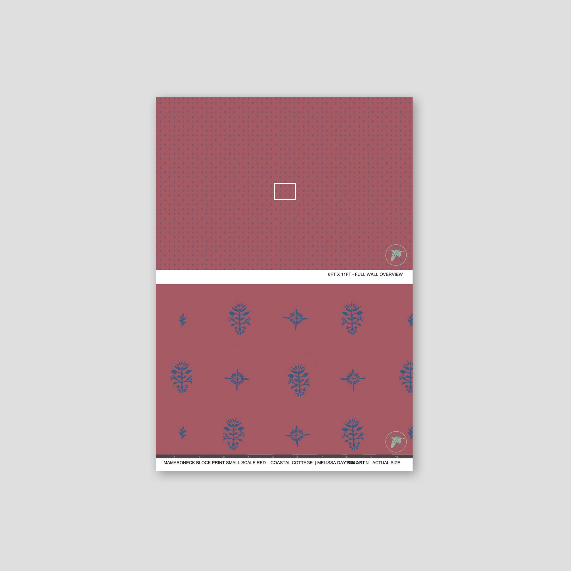 Red notebook with blue floral patterns on a light gray background