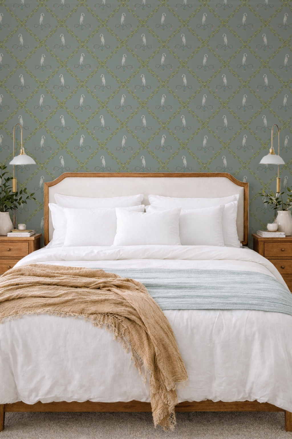 Bedroom with wooden bed, white bedding, and patterned wallpaper.