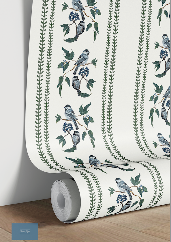 Roll of wallpaper with bird and branch design on a white background