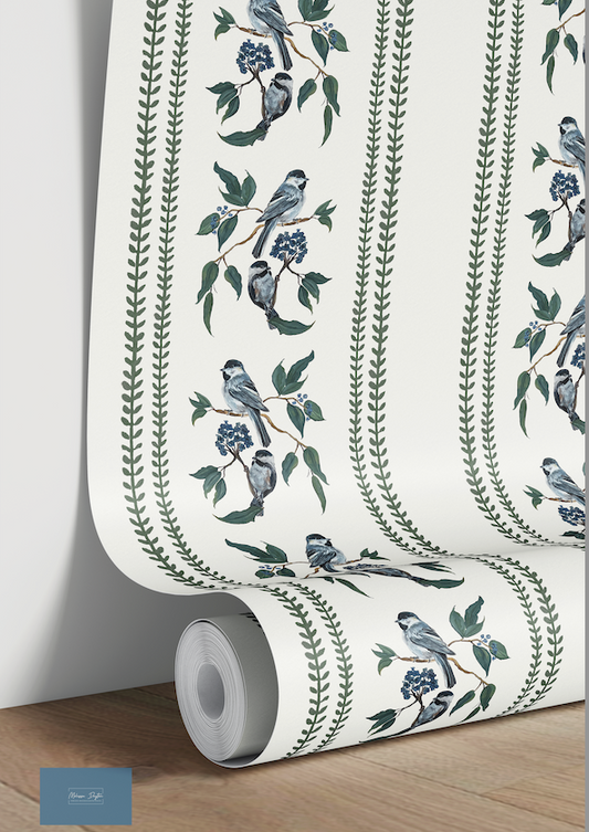 Roll of wallpaper with bird and branch design on a white background