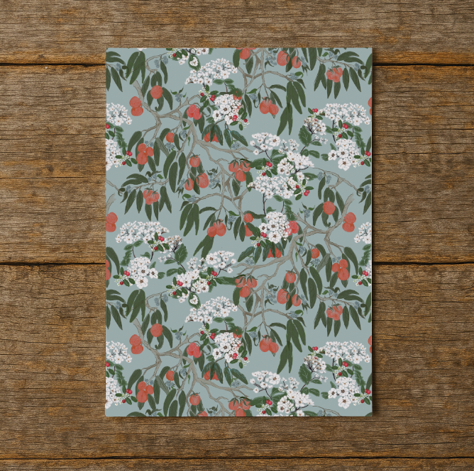 Floral patterned paper on a wooden surface