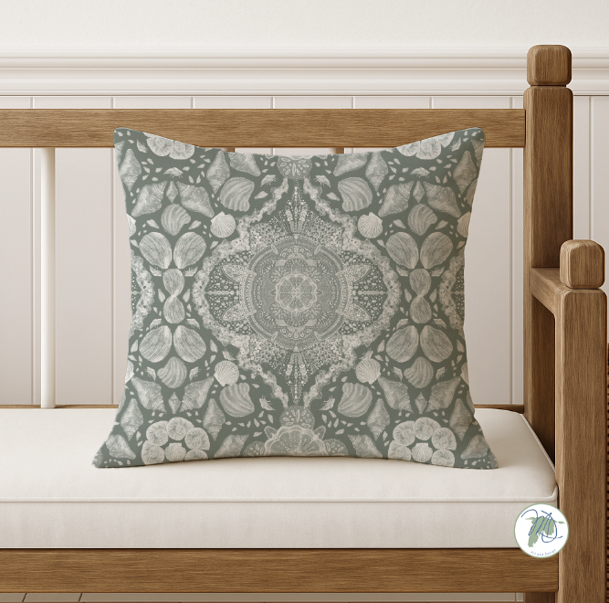 Decorative pillow with a floral pattern on a wooden bench.