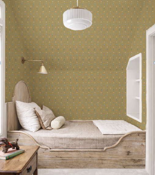 Children's bedroom with green patterned wallpaper, wooden bed, and small nightstand.
