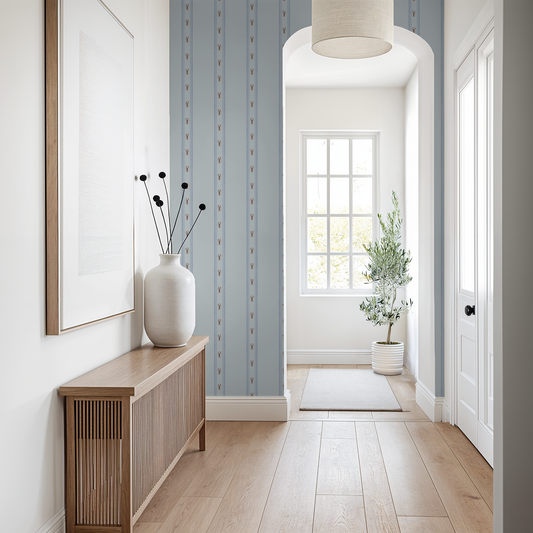 Modern interior hallway with wooden console table, framed picture, and decorative elements.