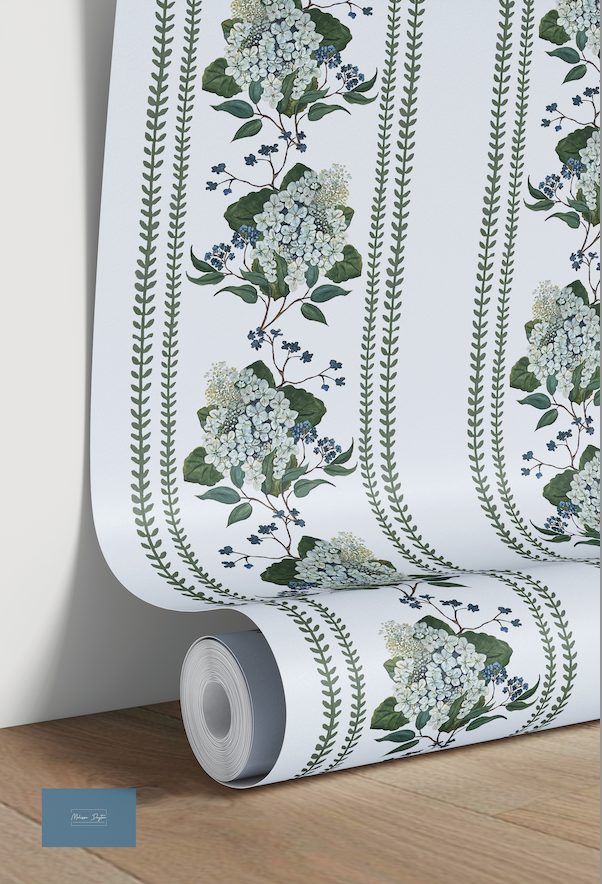 Roll of floral wallpaper with green leaves and white flowers on a plain background