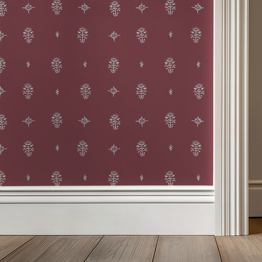 Wallpaper with a subtle pattern on a red background
