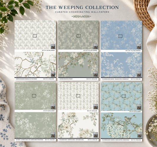 Collection of wallpaper samples with floral patterns on a light surface, labeled 'The Weeping Collection'.