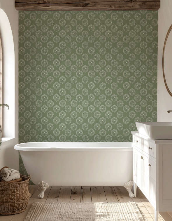 Bathroom with green patterned wallpaper, white bathtub, and wooden floor.