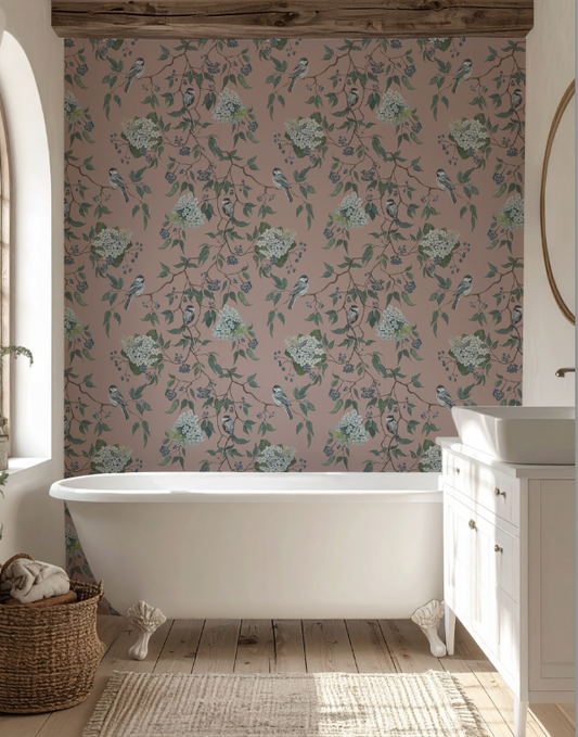 Bathroom with floral wallpaper, freestanding bathtub, and wooden floor.