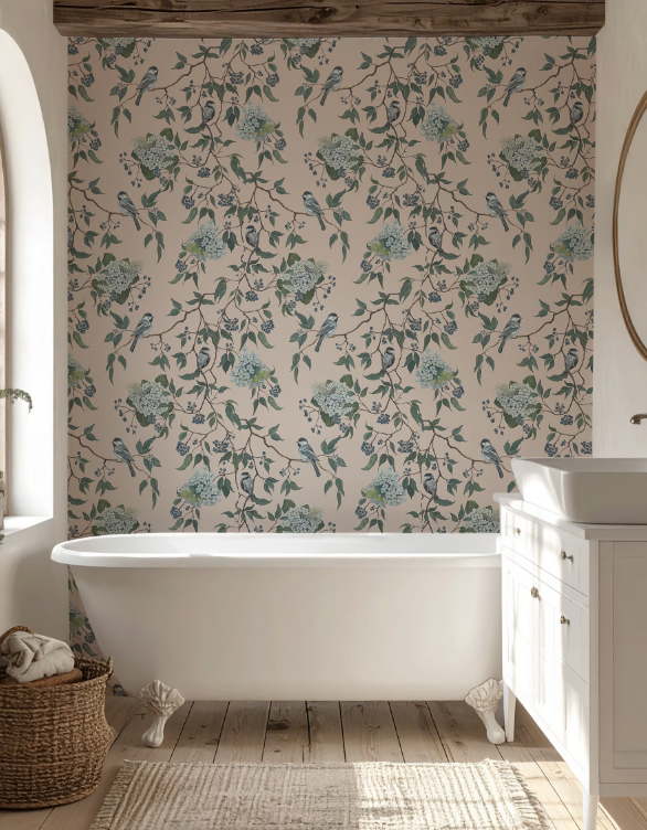 Bathroom with floral wallpaper, freestanding bathtub, and wooden floor.
