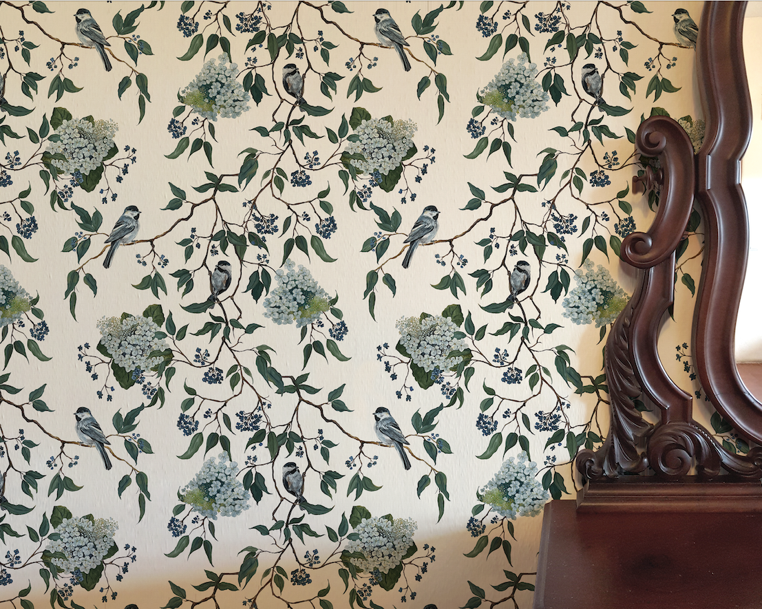 Wallpaper with floral and bird pattern next to a wooden mirror
