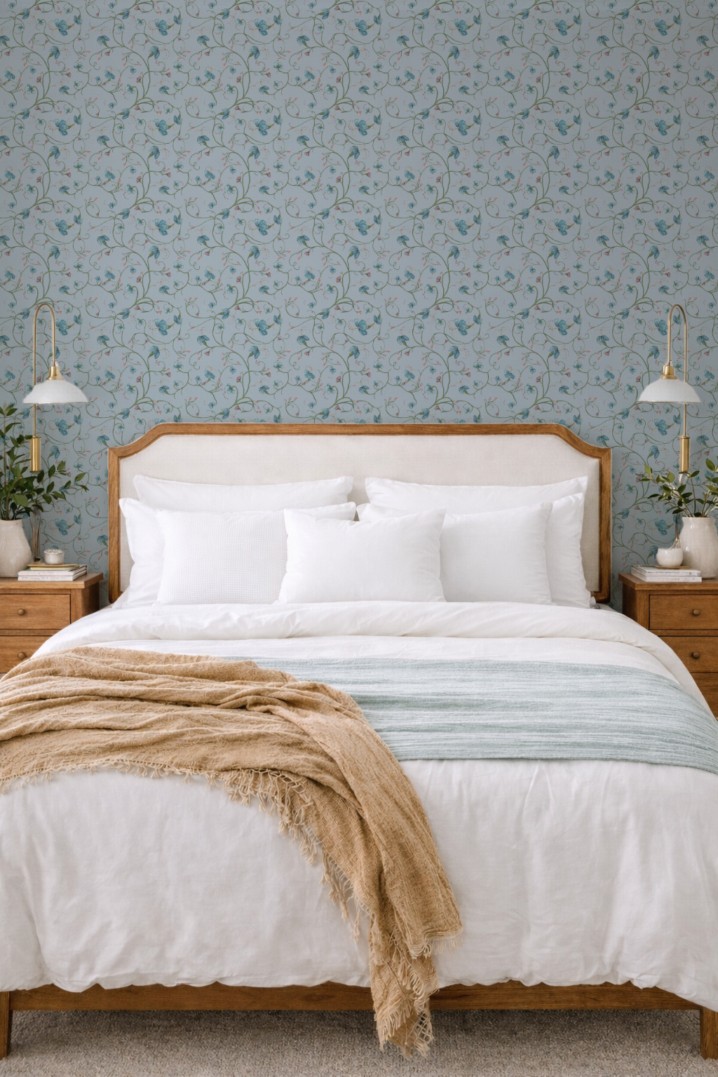 Bedroom with wooden bed, white bedding, and floral wallpaper.