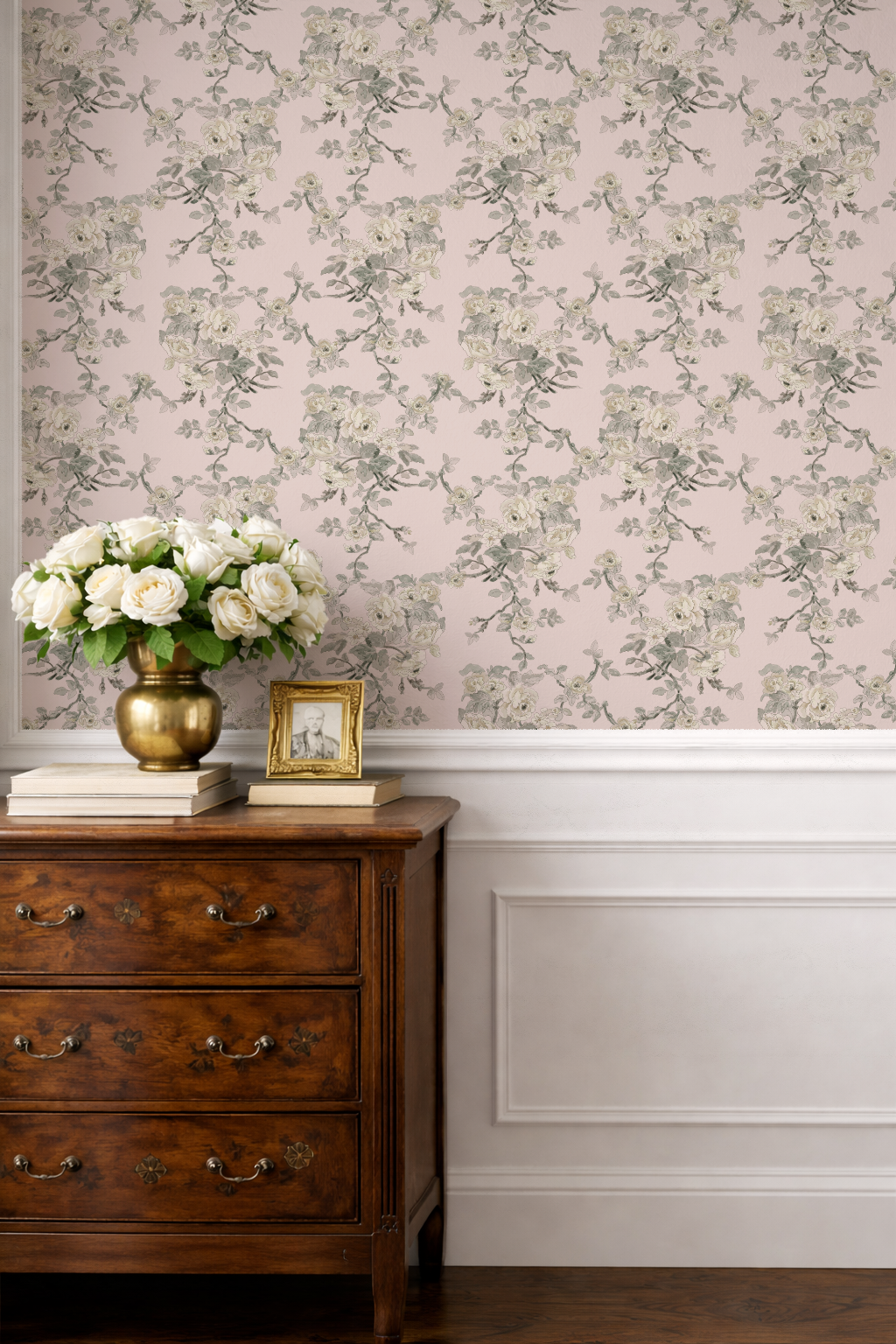 PInk wallpaper with roses and trailing vines. Dresser with frame books and photo The Garden Room Vintage Petal| Weeping Wallpaper by Melissa Dayton