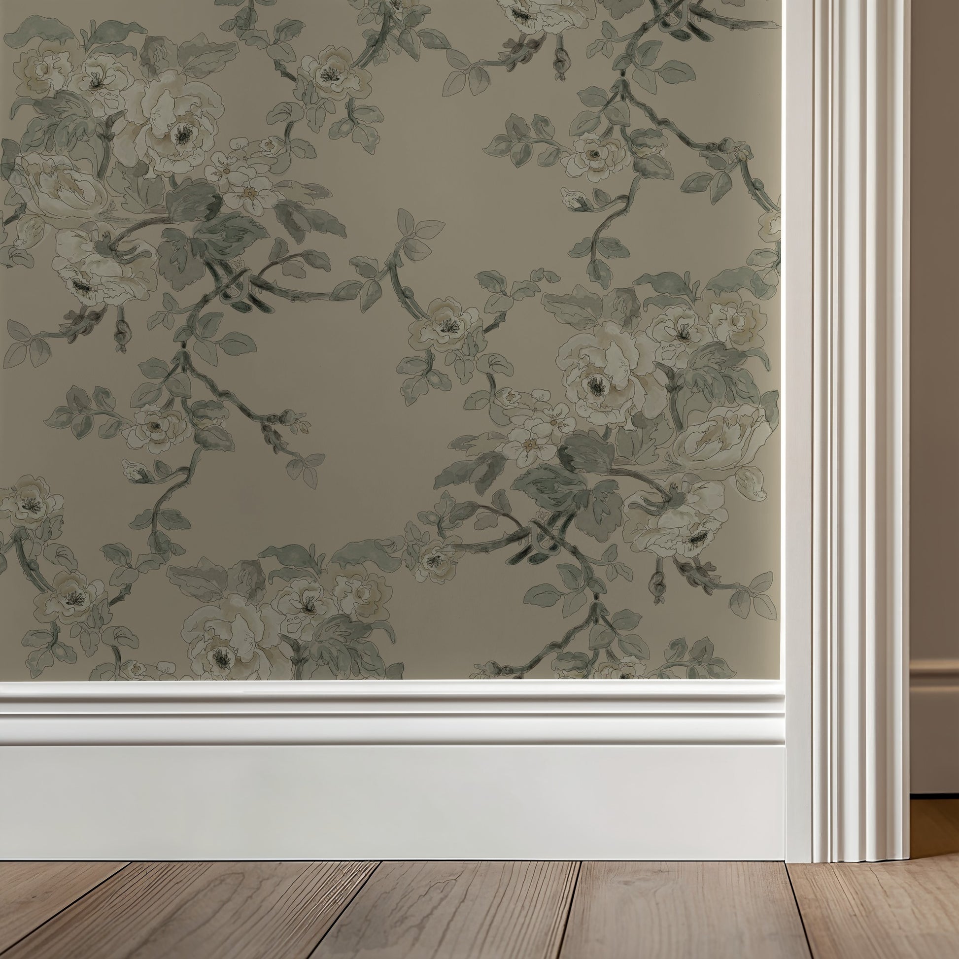 Floral wallpaper design on a wall with wooden flooring.