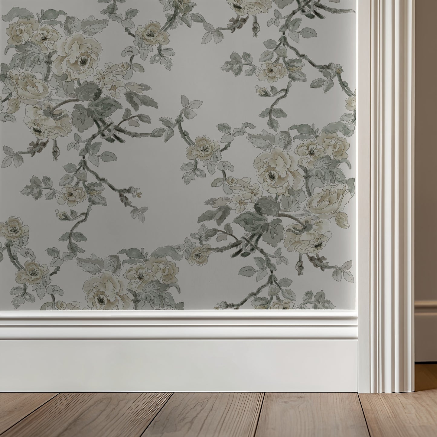 Floral patterned window film on a glass door with wooden floor and wall in the background