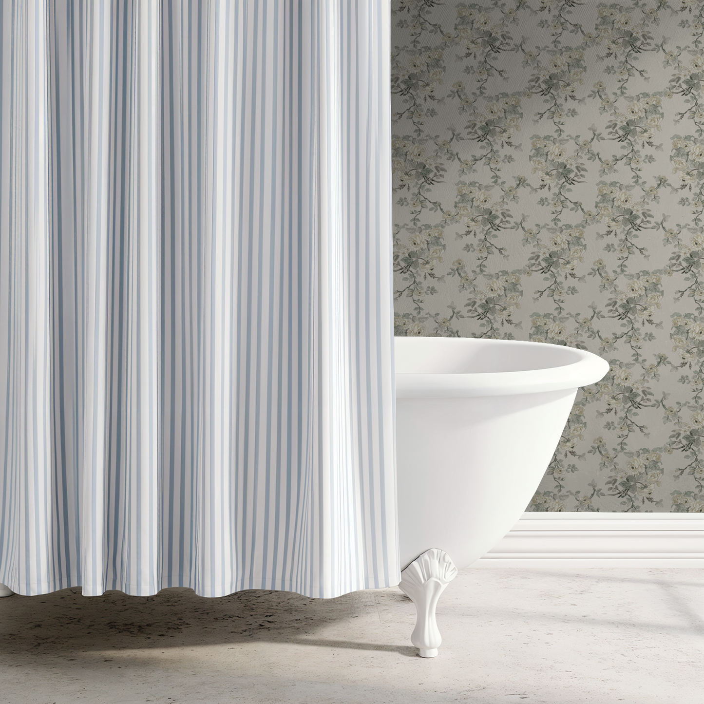 Striped shower curtain in a bathroom with a freestanding bathtub and floral wallpaper.