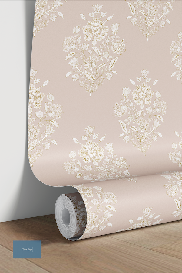 Roll of floral wallpaper on a wooden surface with a light background