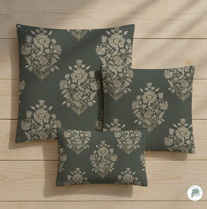 Set of floral-patterned cushions on a wooden surface