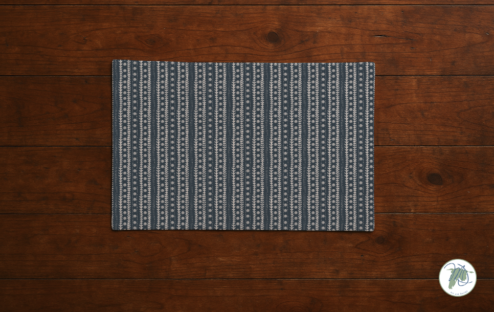 Textile with a geometric pattern on a wooden surface