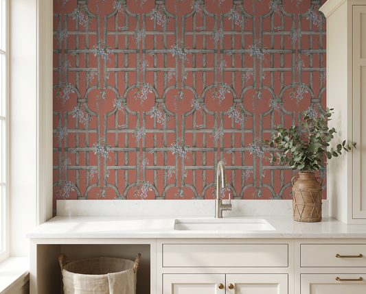 Blood orange trellis wallpaper with floral vines in rustic kitchen setting.
