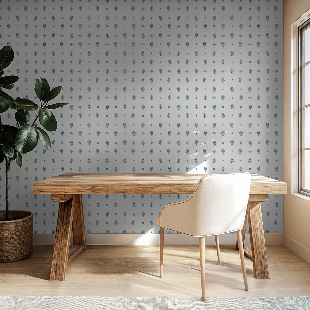Elegant blue botanical wallpaper in modern home office with wooden desk and chair.