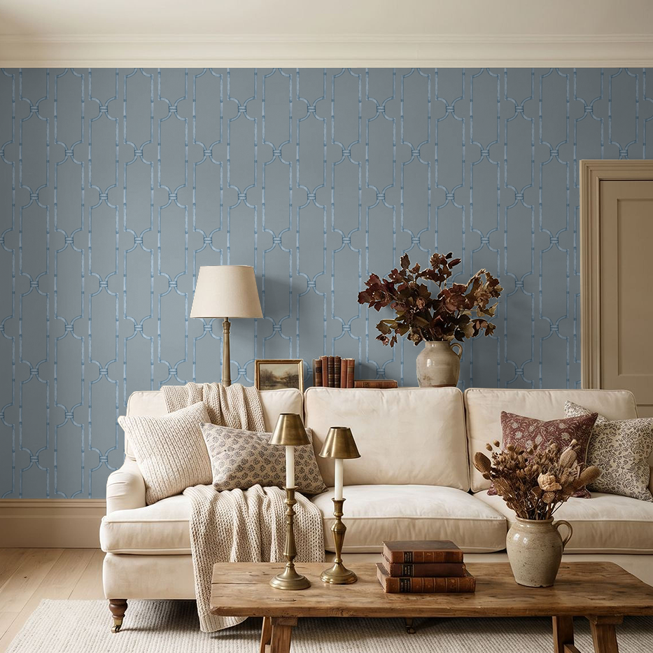 Elegant blue trellis wallpaper in cozy living room with beige sofa and decor.