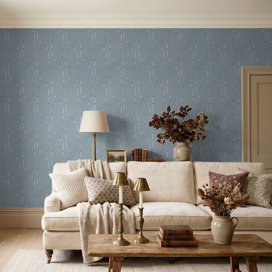 Elegant blue trellis wallpaper in cozy living room with beige sofa and decor.