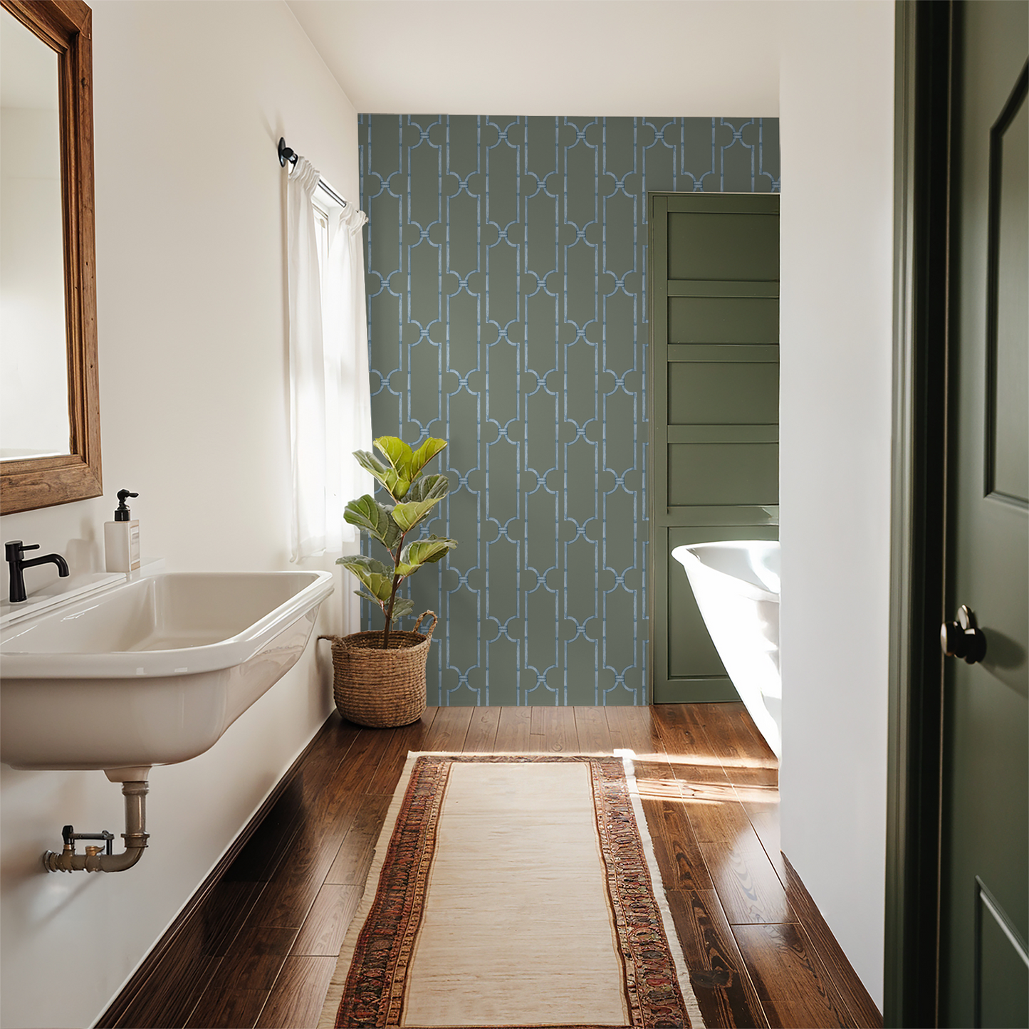 Blue trellis wallpaper in a modern bathroom with wood flooring and green accents.