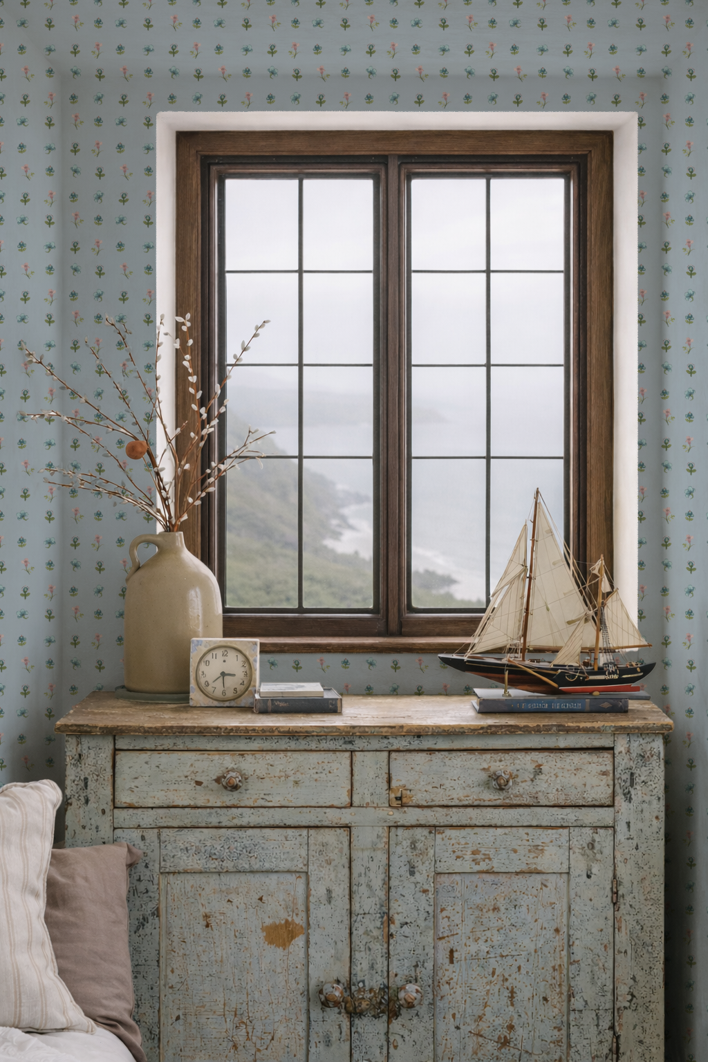 Vintage-style room with a wooden sideboard, window, and decorative items.