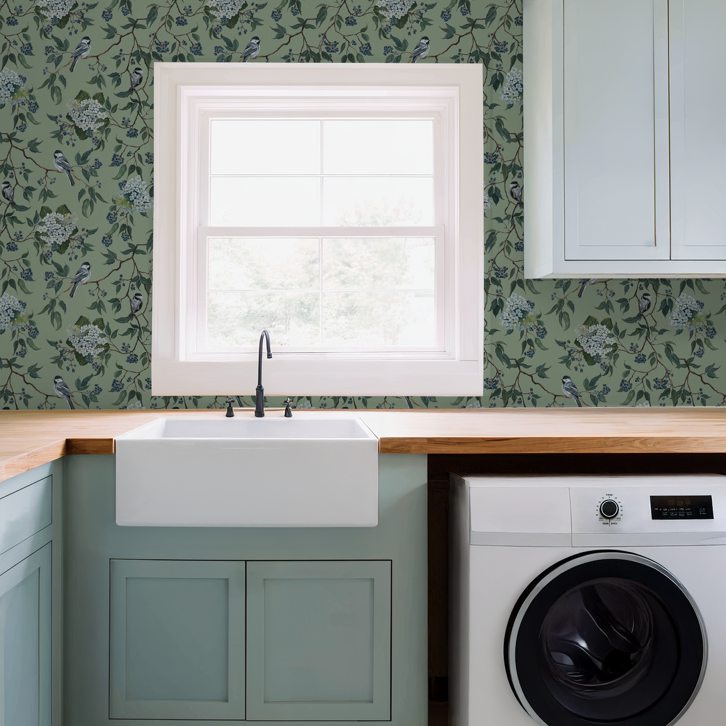 Botanical wallpaper with birds and blossoms in a kitchen setting.