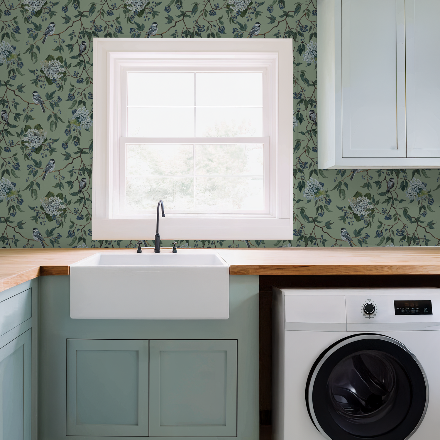 Botanical wallpaper with birds and blossoms in a kitchen setting.