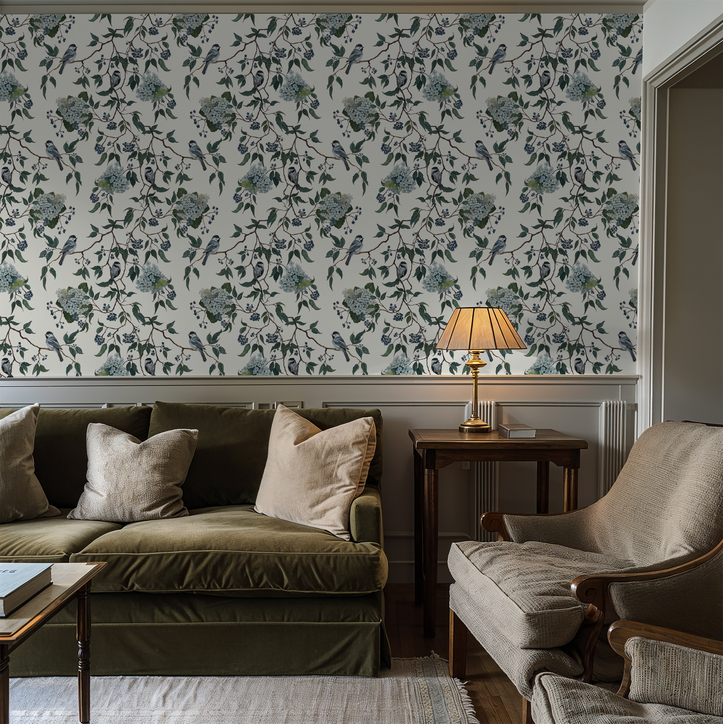 Botanical wallpaper with birds and foliage in a cozy living room setting.