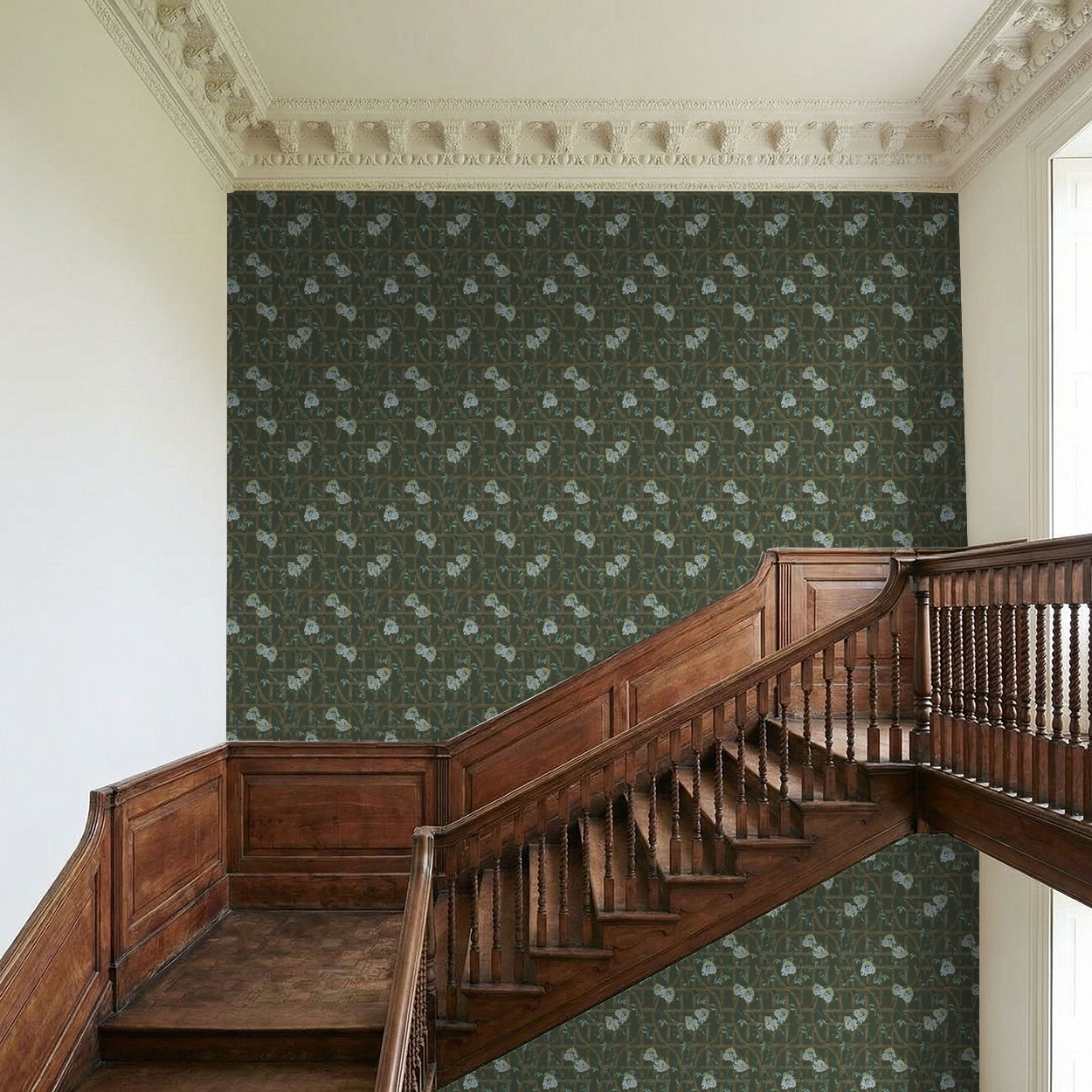 Botanical trellis wallpaper with hydrangeas in a classic staircase setting.