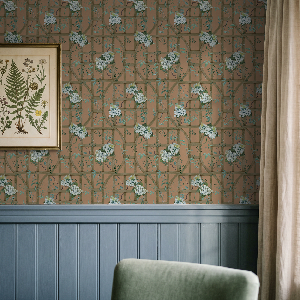Burnt orange wallpaper with hydrangea and trellis pattern in vintage room setting.