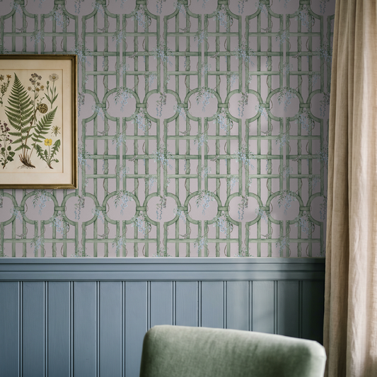 Circle Trellis blush wallpaper with green trellises and vines in a classic room setting.