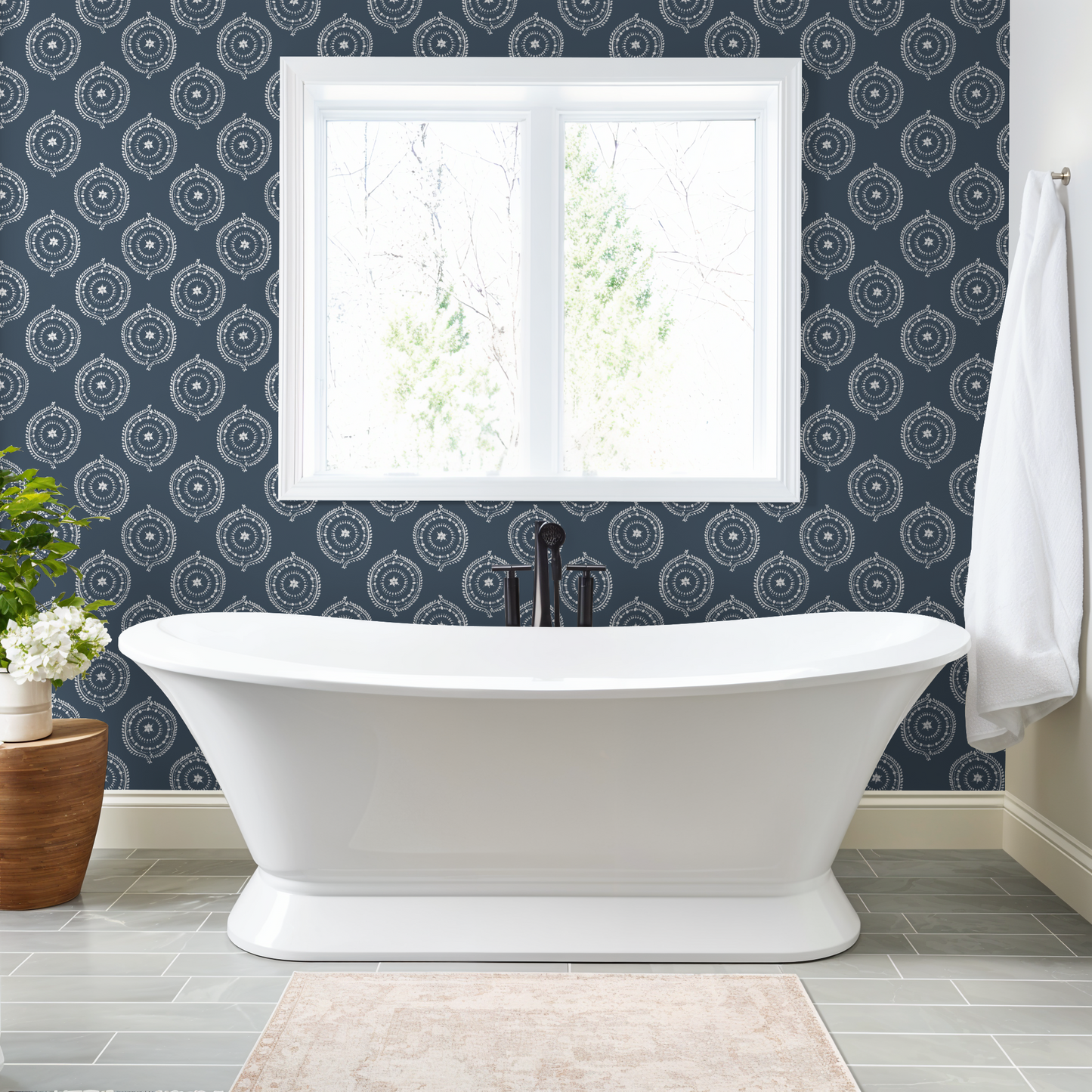 Deep blue rosette wallpaper with white motifs in a modern bathroom setting.