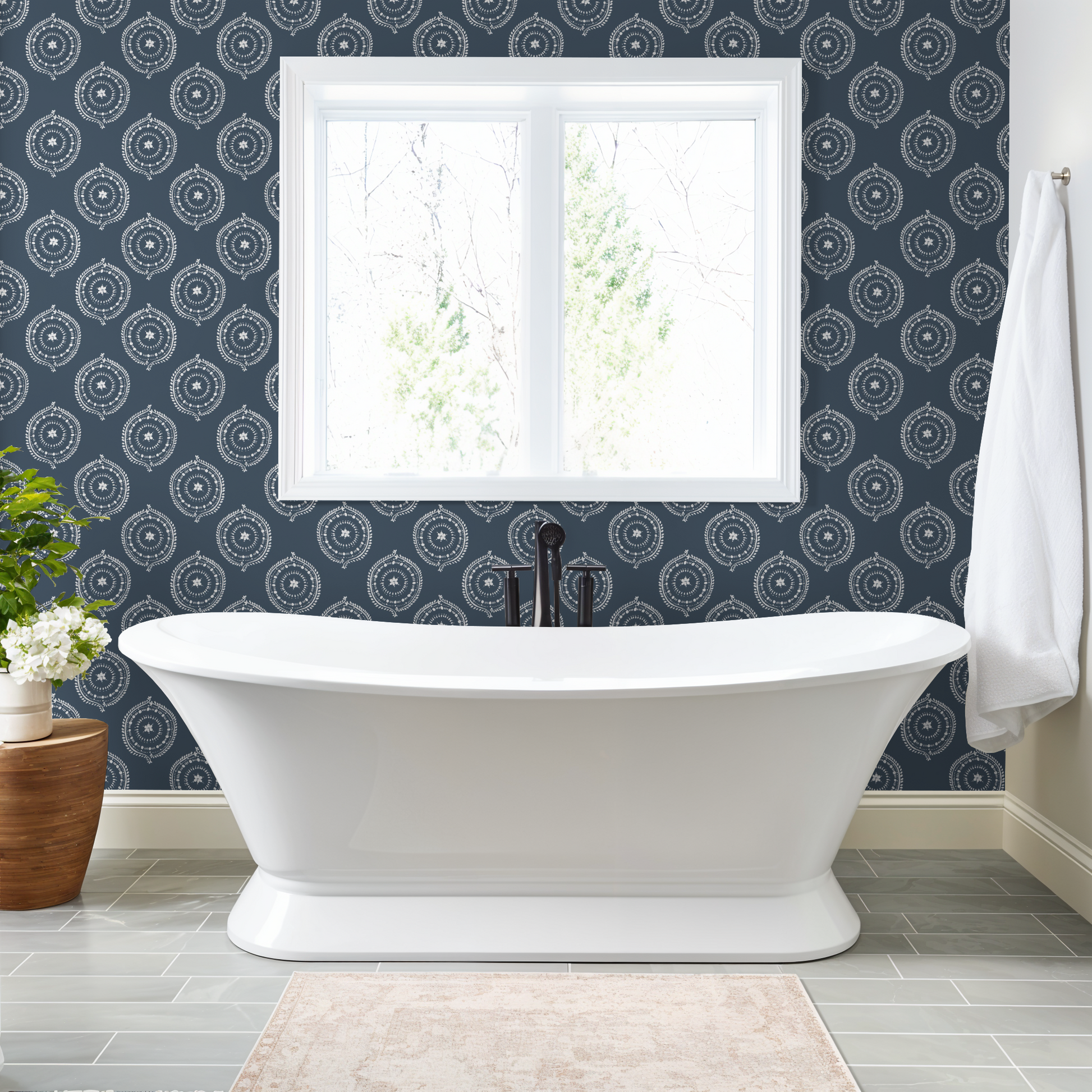 Deep blue rosette wallpaper with white motifs in a modern bathroom setting.