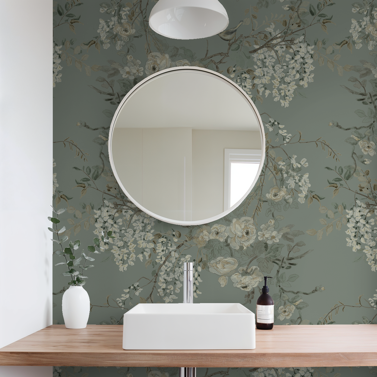Dusty moss green wallpaper with floral and bird pattern in a bathroom setting.