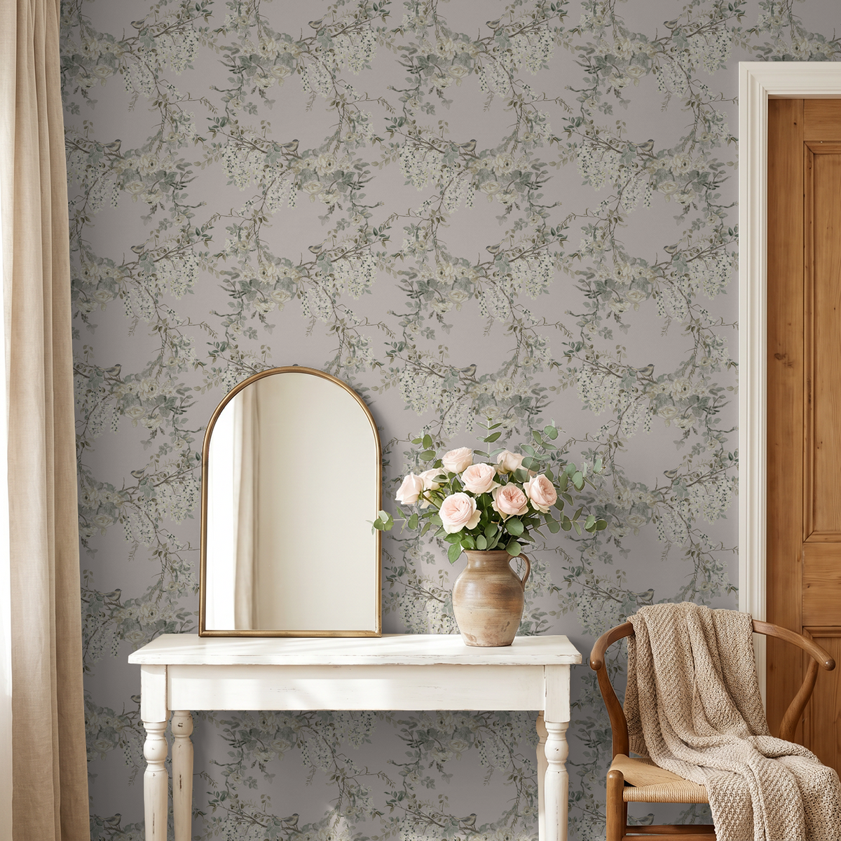 Dusty rose floral wallpaper with branches in elegant living room setting.