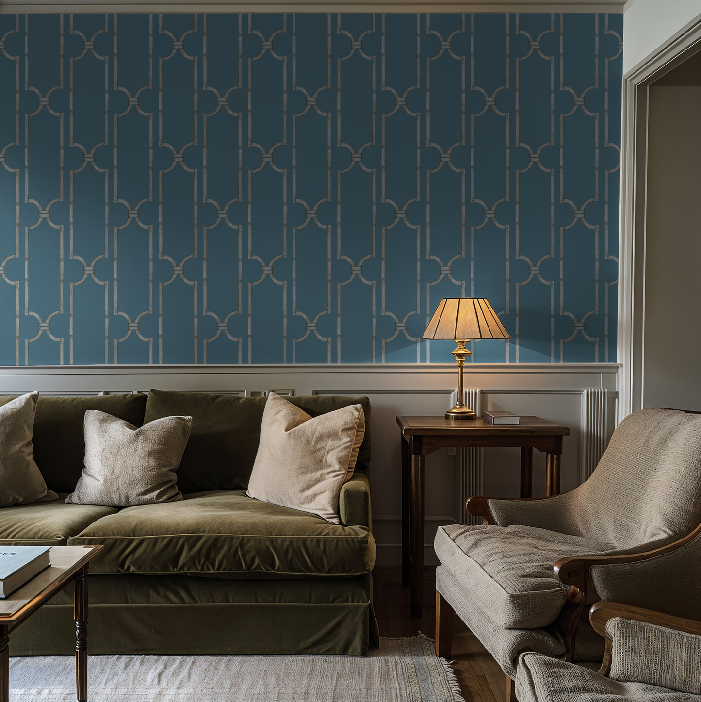Elegant blue trellis wallpaper in a cozy living room with vintage furniture.