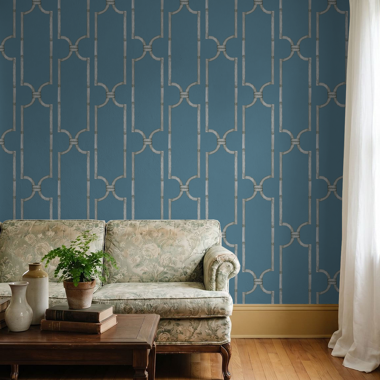 Elegant blue trellis wallpaper in living room with vintage sofa and wooden table.