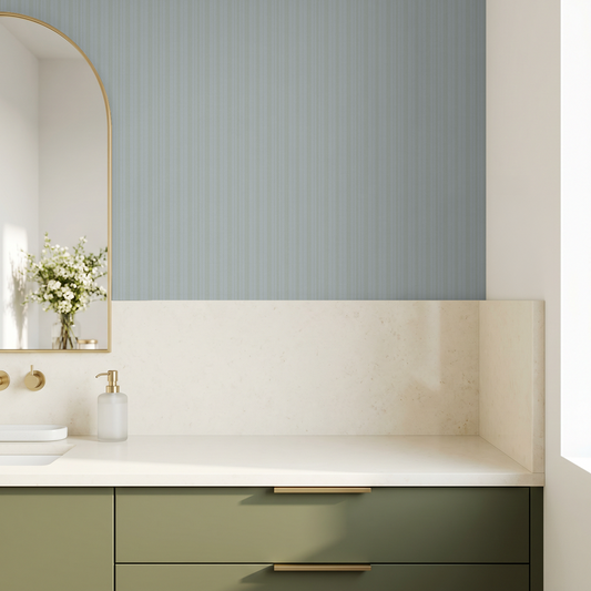 Modern bathroom with Garden Stripe blue-green wallpaper and light wood accents.