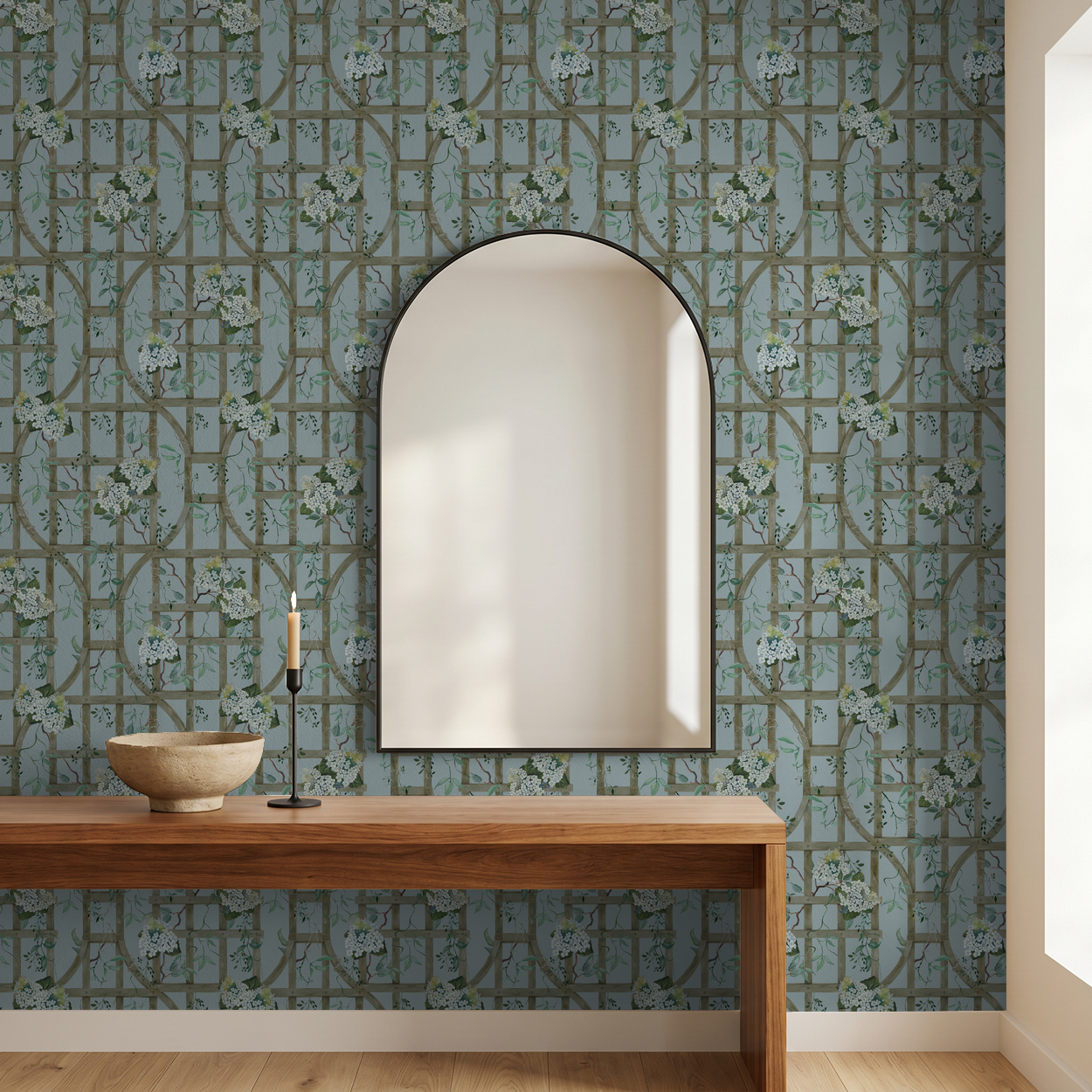 Gray blue trellis wallpaper with hydrangeas in elegant bathroom setting.candle
