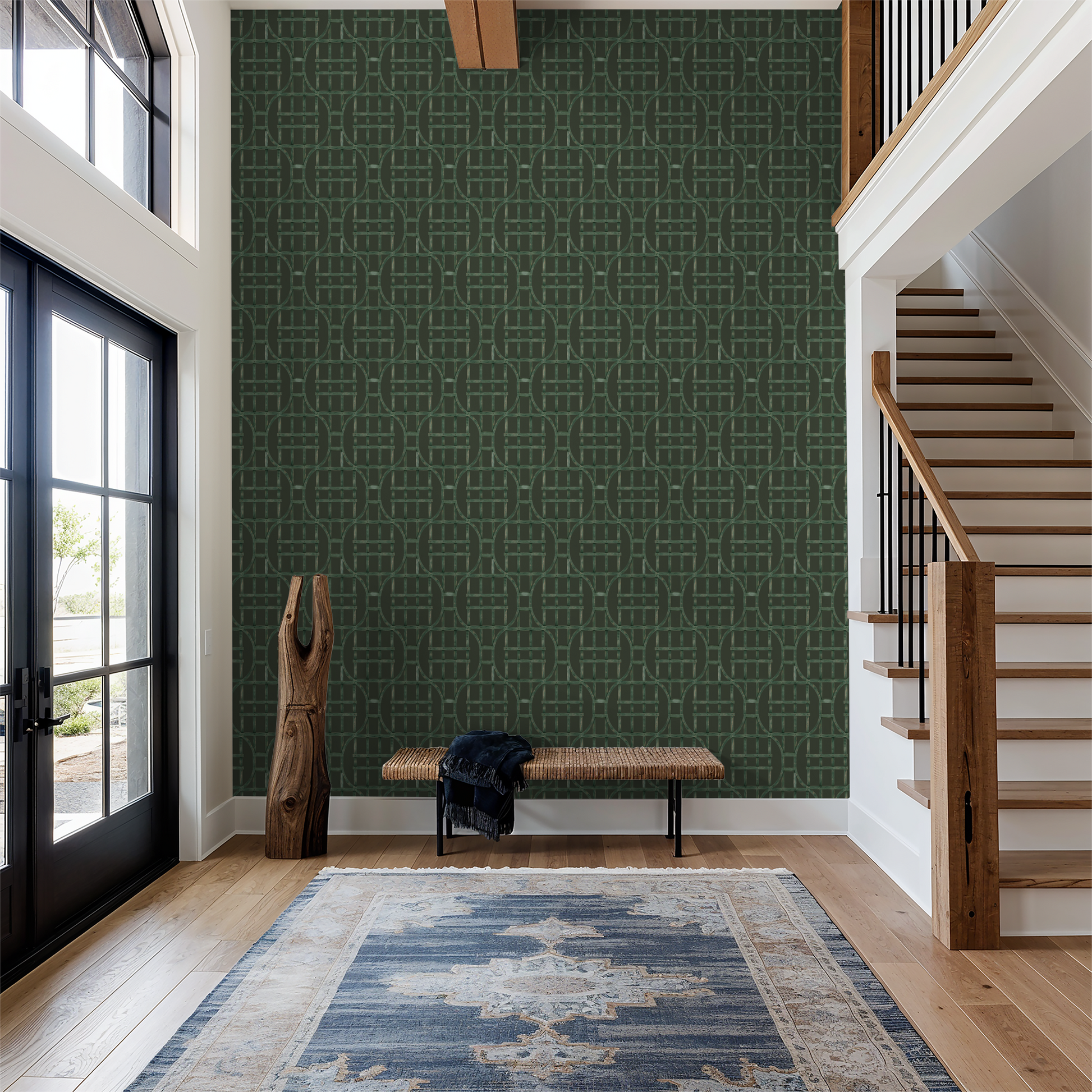 Green trellis geometric wallpaper in modern entryway with wooden stairs.